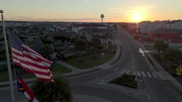 aerial flying by american flag ocean isle beach nc