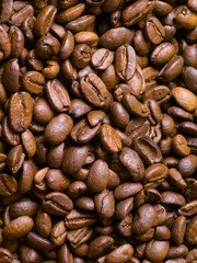 Close up of roasted coffee beans background top view