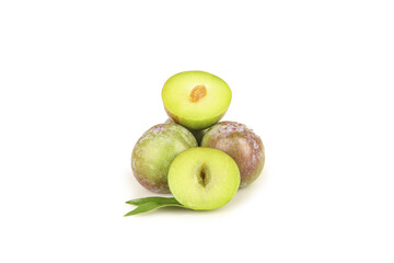 Fresh Green Plums Cut in Half Showing Pit Sweet Crisp Organic Fruit May Harvest