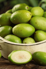 Fresh Green Olives in Wooden Bowl - Natural Mediterranean Food Ingredient
