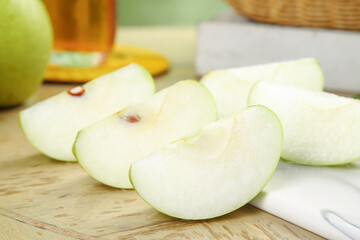 Fresh Green Apple Slices on Wooden Cutting Board - Healthy Eating and Food Preparation
