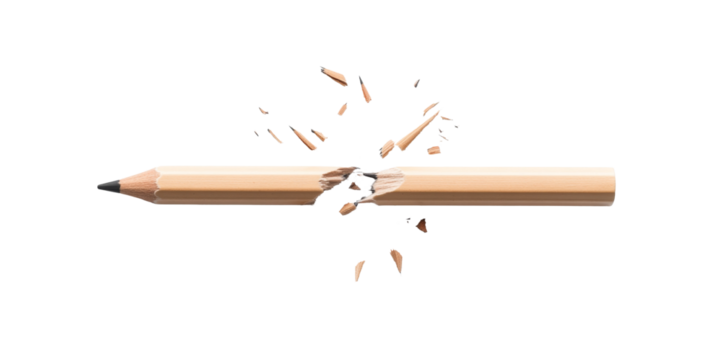 Broken pencil with splintered pieces on black background