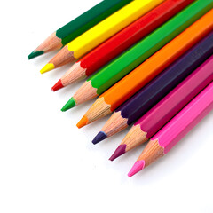 Fototapeta premium Vibrant Rainbow Colored Pencils on White