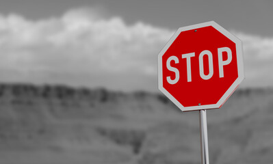 Desert Stop Sign under Blue Sky