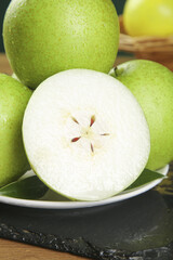 Fresh Green Dangshan Pears on Wooden Base - Healthy Organic Fruit Display