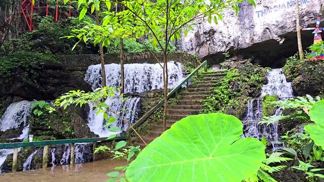 Cool, clear waterfall in the middle of the forest