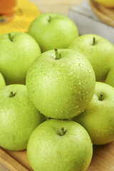 Fresh Green Apples with Water Droplets on Wood Surface - Healthy Organic Fruit
