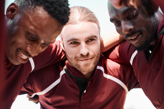Fitness, huddle and man in rugby group on a field planning a strategy for a game, match or tournament. Sports, diversity and captain with team at training, exercise or practice on an outdoor pitch