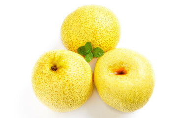 Fresh Golden Dangshan Pears with Mint on White Background - Healthy Fruit Photography