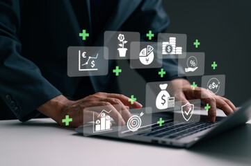 Businessman using laptop manages financial investments, analyzing business growth, economic data, stock market trends. Digital technology interface shows icons banking, currency exchange, savings,