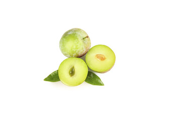 Fresh Green Plums Whole and Halved with Leaves on White Background