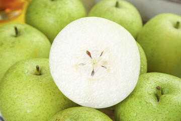 Fresh Green Apples Cut in Half Showing Interior with Seeds - Healthy Organic Fruit