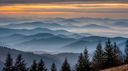 Morning fog envelops a serene mountain landscape, with the sun's first light breaking through the clouds to reveal a peaceful view of the valley and snow-capped peaks