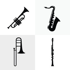 Minimalist silhouettes of musical instruments trumpet saxophone trombone clarinet set silhouette vector illustration white background