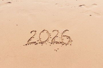 Christmas inscription 2026 on the  summer beach