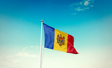 Moldova national flag waving in beautiful sky with mast. A proud moment flag waving with sunlight.
