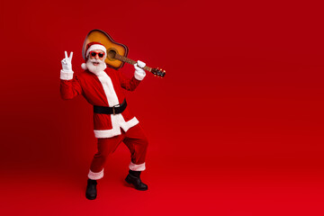 Santa Claus enjoying the holiday spirit with a guitar against a festive red background, celebrating Christmas and spreading joy