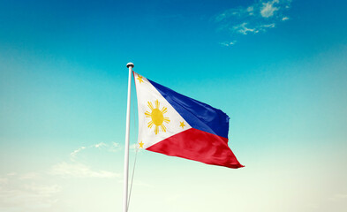 Philippines national flag waving in beautiful sky with mast. A proud moment flag waving with sunlight.