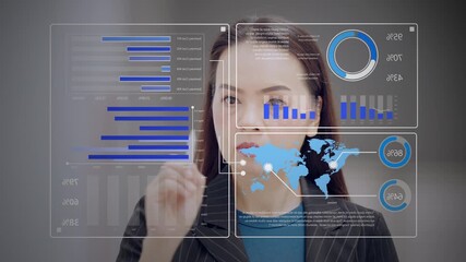 Asian businesswoman using futuristic digital dashboard with graphs, charts, and world map to analyze business data. Concept of global strategy and data analytics. - Powered by Adobe