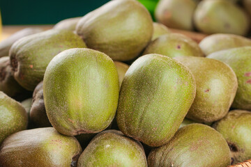 Fresh Kiwi Fruits in Wooden Basket - Healthy Organic Produce Display