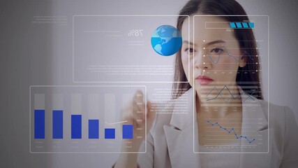 Asian businesswoman interacting with real-time virtual dashboard showing data loading bar, global chart, and multiple analytics elements. Concept of digital processing and smart decision making. - Powered by Adobe
