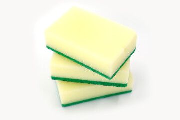 Three Yellow Dishwashing Sponges on White Background