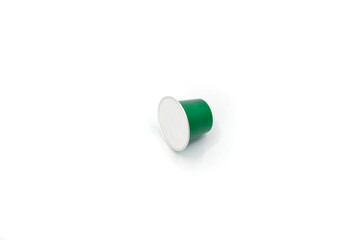 Green Coffee Capsule for Espresso Machine on White Background