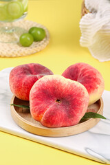 Fresh Shaanxi Peaches on Wooden Plate - Premium Quality Fruit Display for Healthy Eating