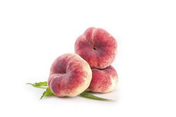 Fresh Red Flat Saturn Peaches with Leaves Isolated on White Background - Premium Stone Fruit