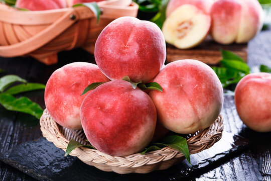 Fresh Yangshan Peaches in Wicker Basket - Summer Fruit Harvest Display