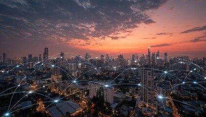 Obraz premium Aerial view of a city at sunset, network lines connecting buildings