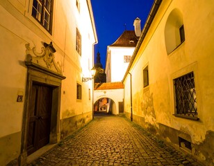 Fototapeta premium Old European alleyway at night