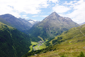 Fototapeta premium The view of Vent village opening from the high hiking way from Tiefenbach glacier to Vent in Oetztal valley in the Austrian Alps 