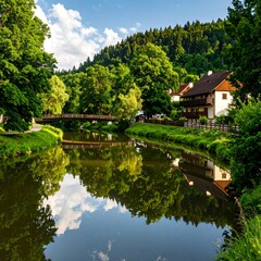 Fototapeta premium Peaceful river reflecting a village