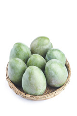 Fresh Green Panzhihua Mangoes in Wicker Basket on White Background