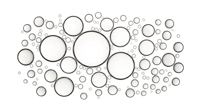 Macro view of numerous white liquid bubbles on a dark background.