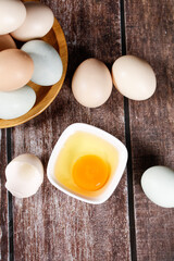 Fresh Farm Eggs on Rustic Wood Table with Golden Yolk - Organic Countryside Produce