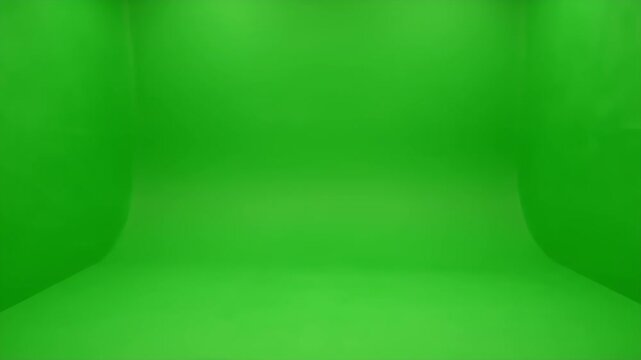 Empty Green Screen Studio Background with Seamless Curved Wall and Floor for Chroma Key Compositing