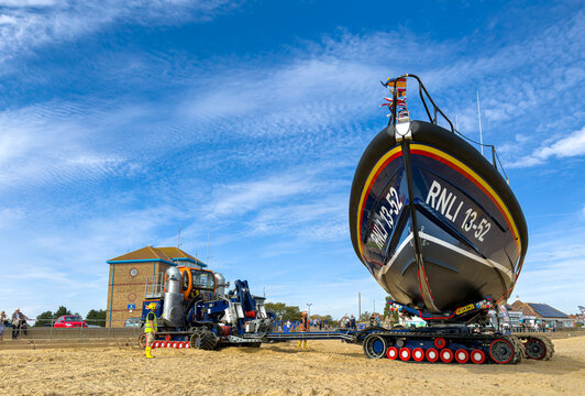 Lifeboat on rotating Beach Recovery and Launch Tractor Trailer