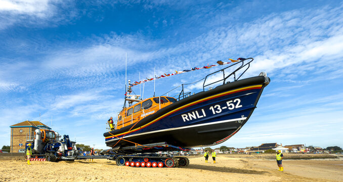 Lifeboat on rotating Beach Recovery and Launch Tractor Trailer