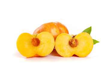 Fresh Shandong Peaches Cut in Half Showing Yellow Flesh on White Background