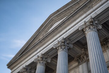 Naklejka premium Ornate architecture with pillars and blue skies offer grandeur and stability for legal themes, financial services, or government institutions