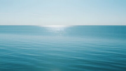Obraz premium Calm Ocean Horizon Under Clear Sky