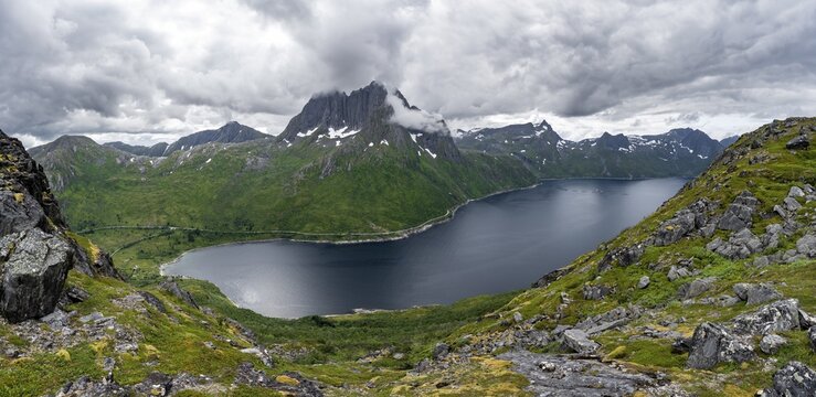 View of Mefjorden fjord from Barden mountain, Breidtind mountain peak behind, Senja, Norway