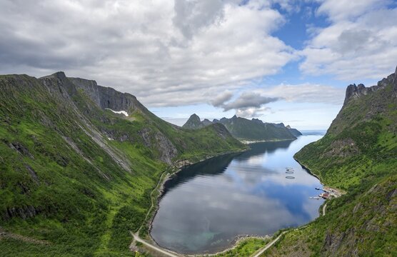 View of &Oslash;yfjorden fjord and mountains, fjord landscape with mountain peaks, hike to Barden mountain, Senja, Norway