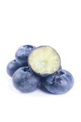 Fresh Yunnan Blueberries Cut in Half Showing Interior on White Background