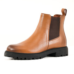Elegant brown leather Chelsea boot with black sole isolated on white background, perfect for men’s casual and formal wear.
 durable and versatile footwear design for fashion and lifestyle projects.