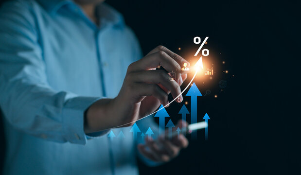 Interest rate increase concept. Businessman show  percentage and up arrow investment, Interest rate increase, business hike growth, stocks, mutual fund, high exchange rate. Long term investment