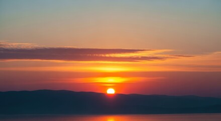 Fototapeta premium Vibrant Sunset Over Water.