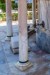 Decorative faucet of the well where people wash their feet before entering the Al Jazzar Mosque in Acre, Akko's old city on a sunny day.

